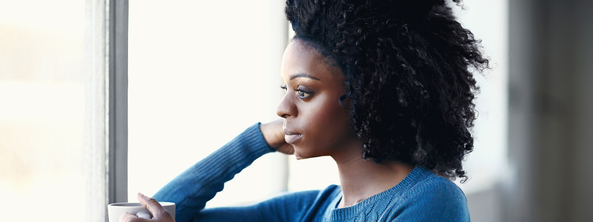 Woman reflecting on what her life would be like without depression in Roswell